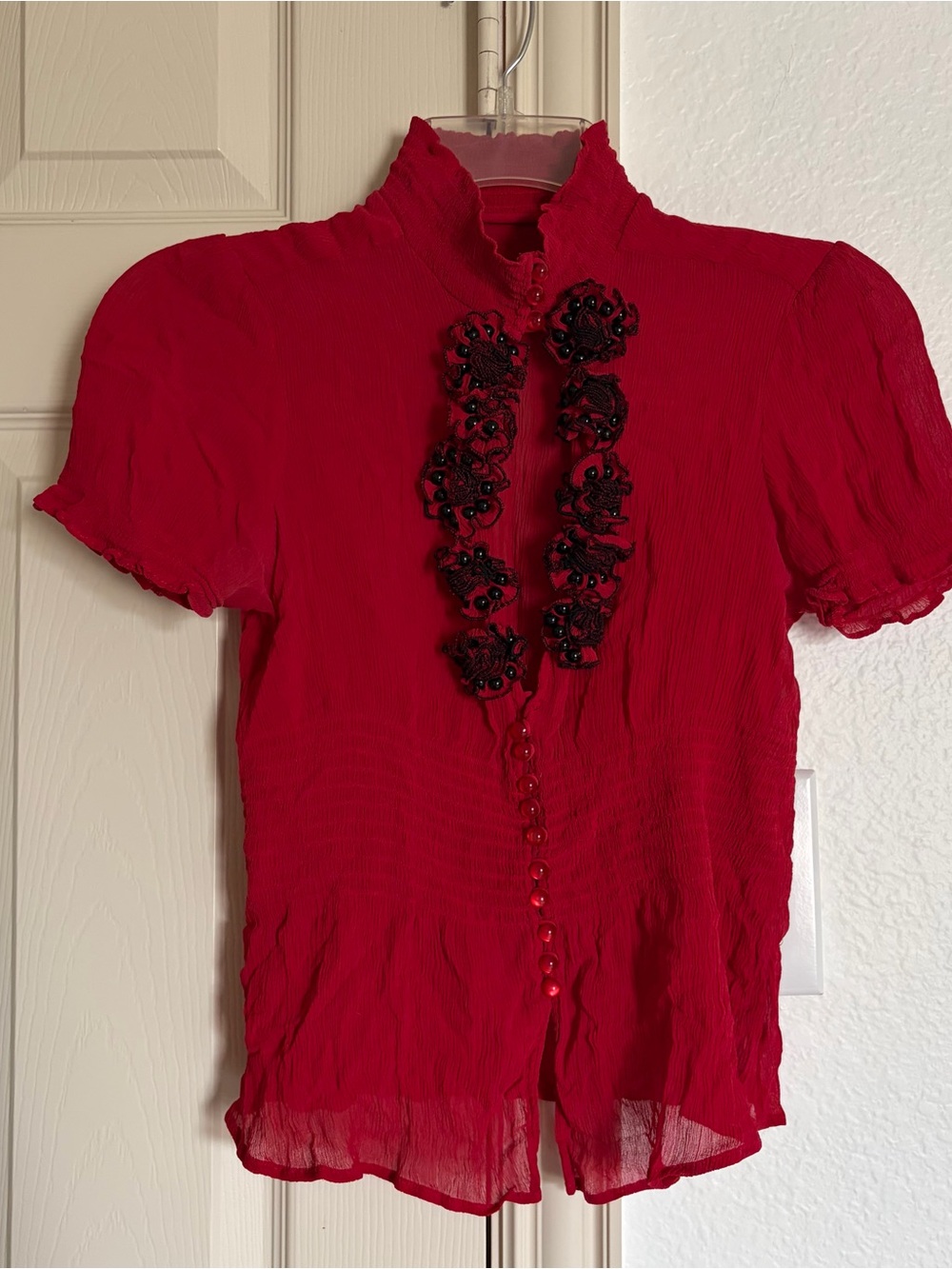 Red silk ruffle top